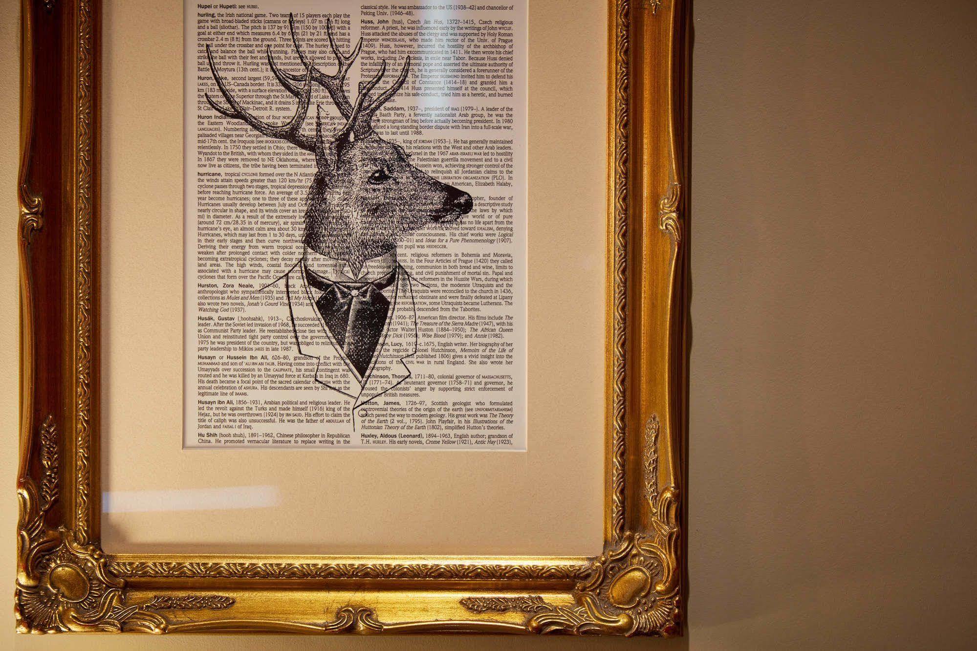 Oddfellows On The Park Cheadle  Luaran gambar A framed print of a deer head with a bow tie